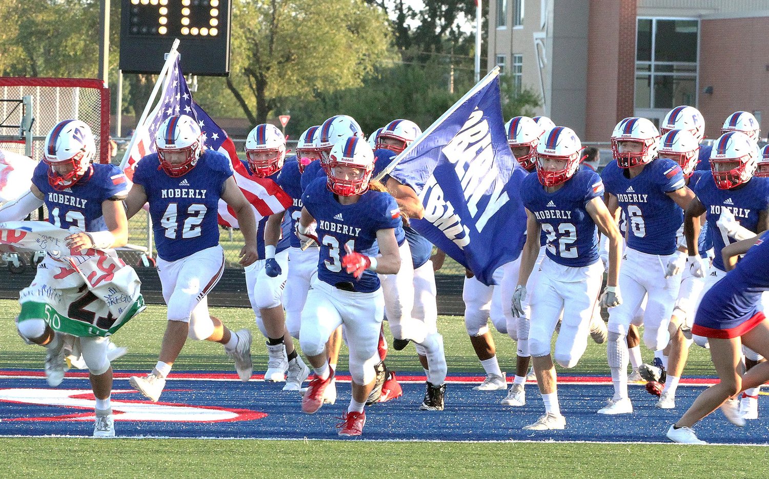 The Class 4 third-ranked Moberly Spartans football team rush to the field at the start of a home game played earlier this 2020 season at Dr. Larry K. Noel Spartan Stadium. Christian High School of O'Fallon canceled its scheduled matchup Friday, Oct. 23 due to COVID-related concerns. As a result, Moberly may end up not playing games for the next two weeks leading up to their scheduled Nov. 6 district contest.