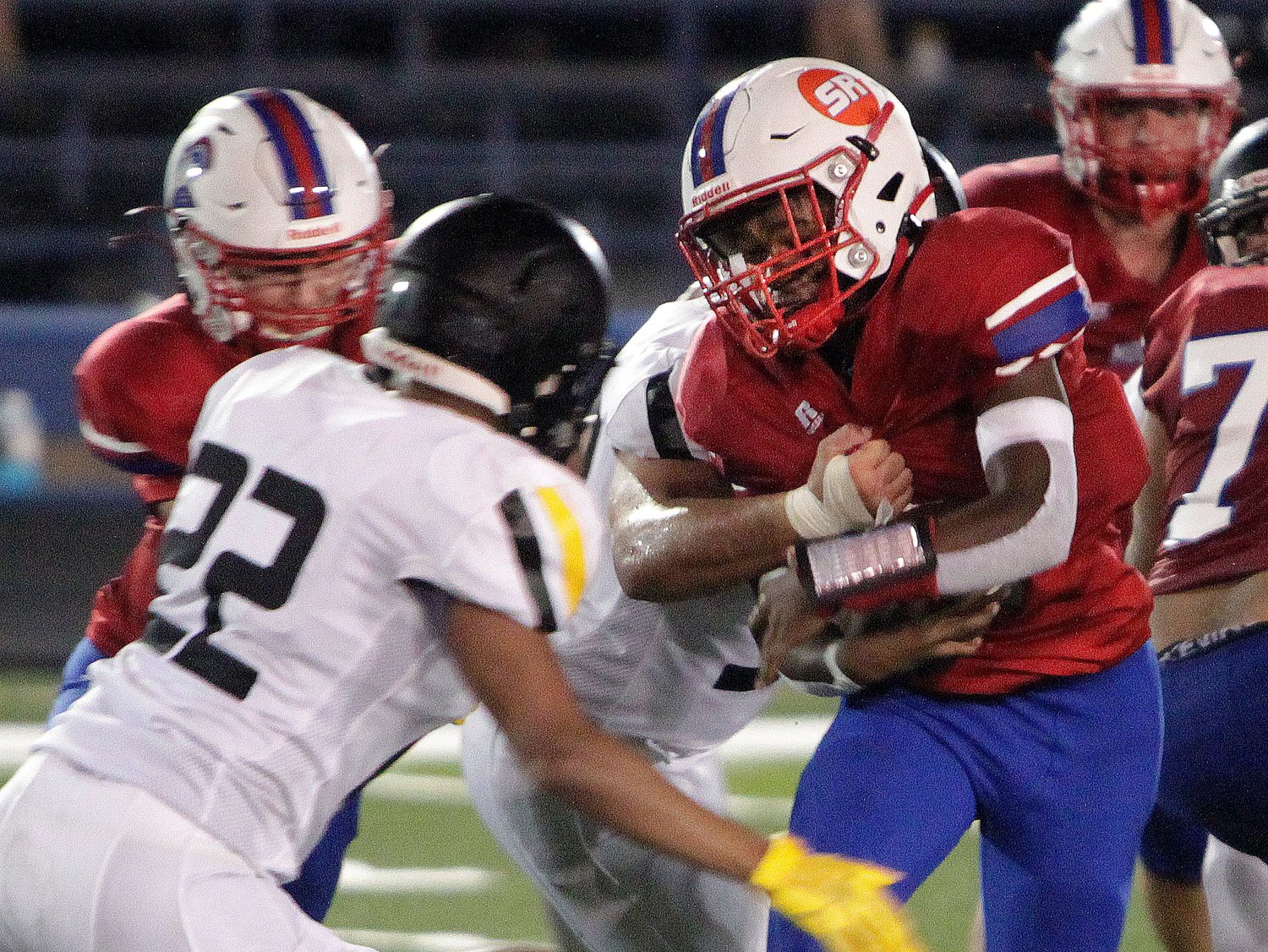 Moberly sophomore running back Chris Alexander was one of many Spartan players making their varsity debut in the 2021 football season opener at home Friday, Aug. 27. Alexander (No. 1) carried the ball seven times for 11 yards during the Spartans 32-12 loss to Smith-Cotton High School of Sedalia.