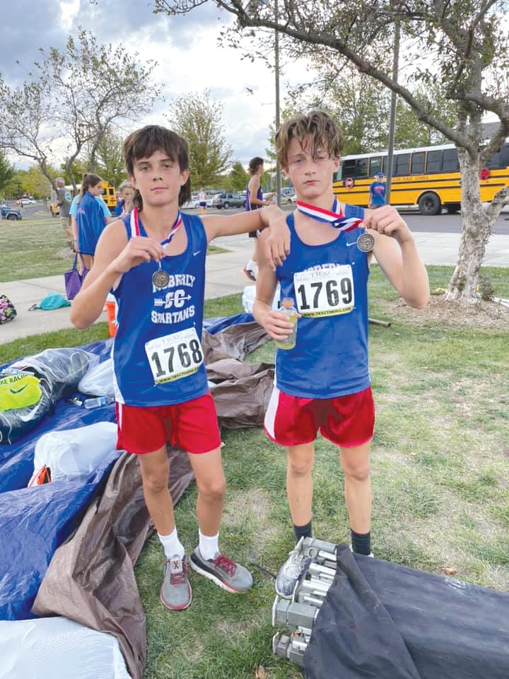 Moberly’s Edmond Roberts, left, and Derrick Sanders were the two medalists for the boys team at last week’s home meet. (Submitted photo)