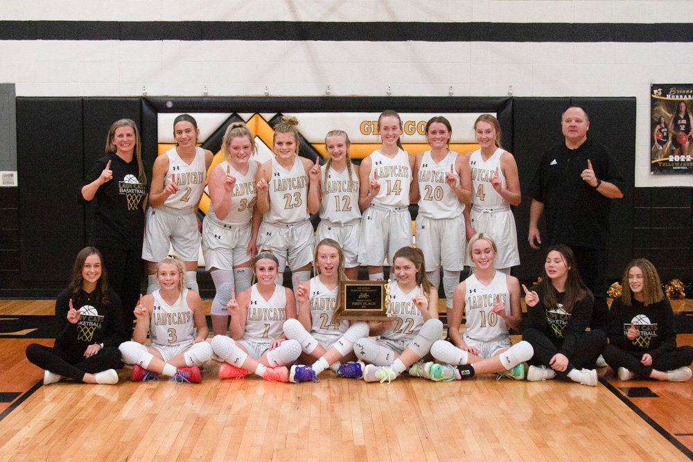 Cairo girls basketball pose with its Glasgow Tournament trophy.