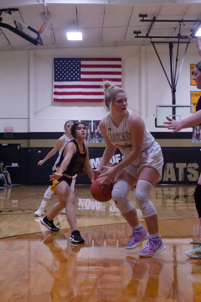 Avery Martin sets in the lane as she had a game-high 12 points for Cairo in its 76-17 win over Madison Tuesday night.