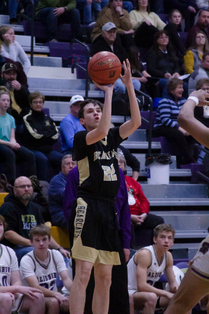 Cairo’s Dalton Taylor shoots a 3-pointer. Taylor had three 3-points and another basket for 11 points to lead the Bearcats. (Michael Allshouse)