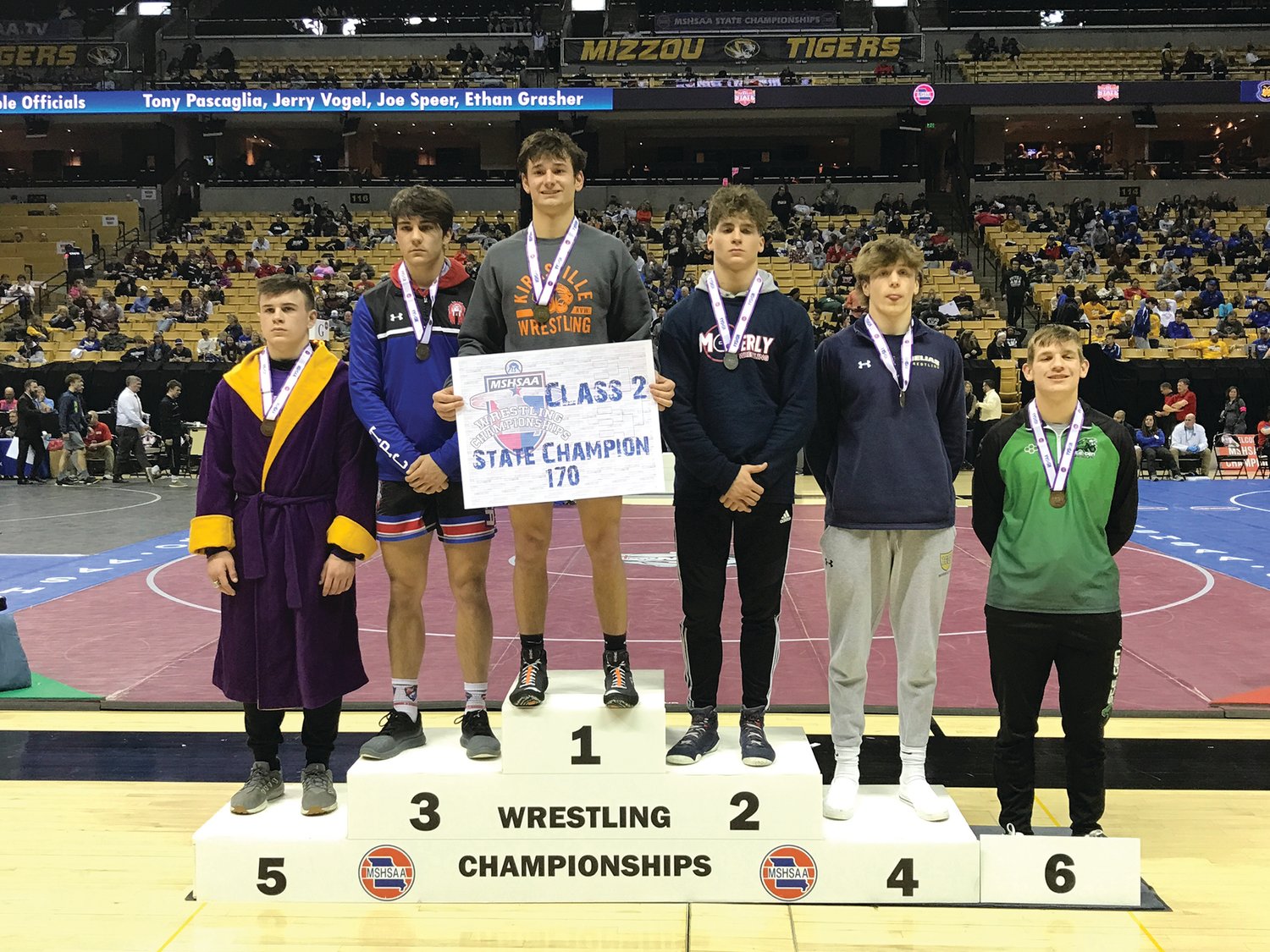 Moberly senior Zach Lewis, third from the right, stands on the medal stand after placing second in the Class 2 170-pound division Saturday. Lewis, a three-time state medalist, finished his senior year with a 43-3 record. (Will Johnson/Gasconade County Republican)