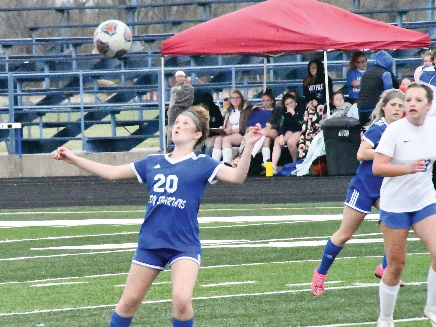 Moberly’s Zaylee Heaton (20) attempts to trap the ball during last Thursday’s match with Boonville. Heaton scored once and had an assist in the Spartans’ 5-0 victory.
