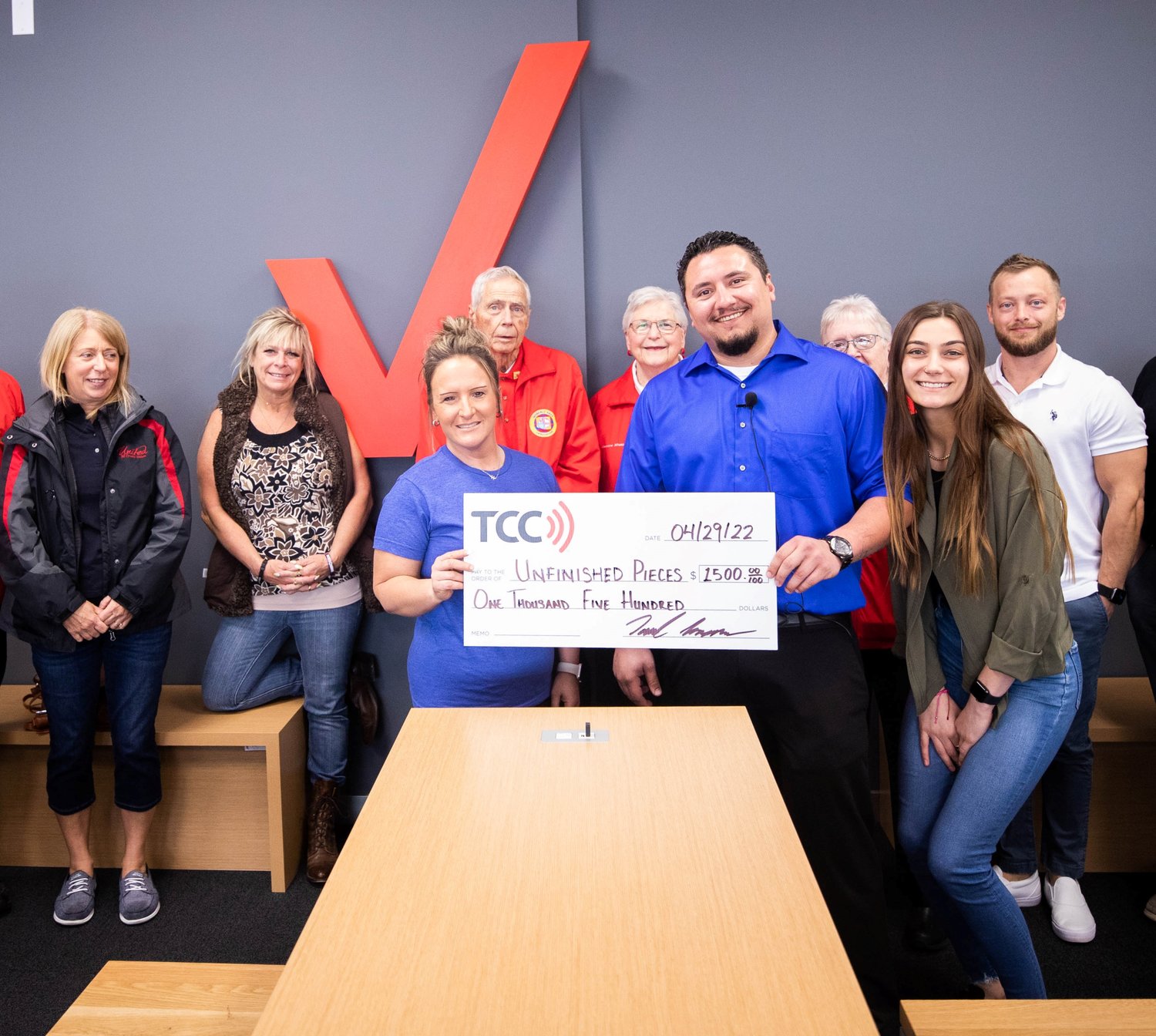 Moberly's local Verizon store donates $1,500 from TCC to Unfinish3d Pieces, a Moberly non-profit organization dedicated to increasing autism awareness. The store held its grand opening and ribbon-cutting last month.