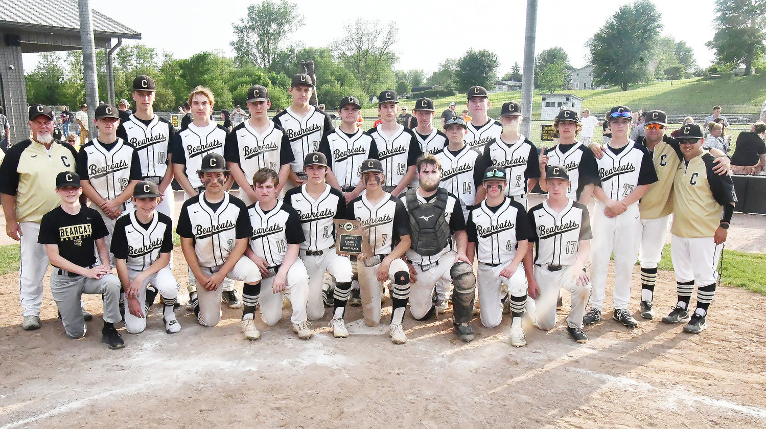 The Cairo baseball team is all smiles after winning the Class 1 District 12 championship on Tuesday evening at John Donaldson Field in Glasgow.