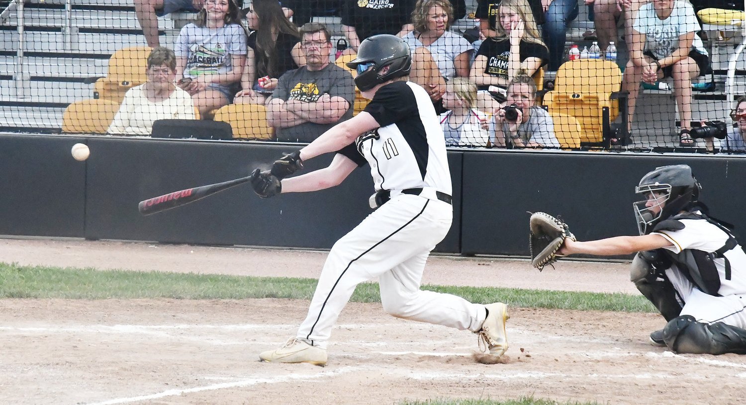 Ryan Tracy hits a single during Tuesday's Class 1 District 12 championship game in Glasgow.