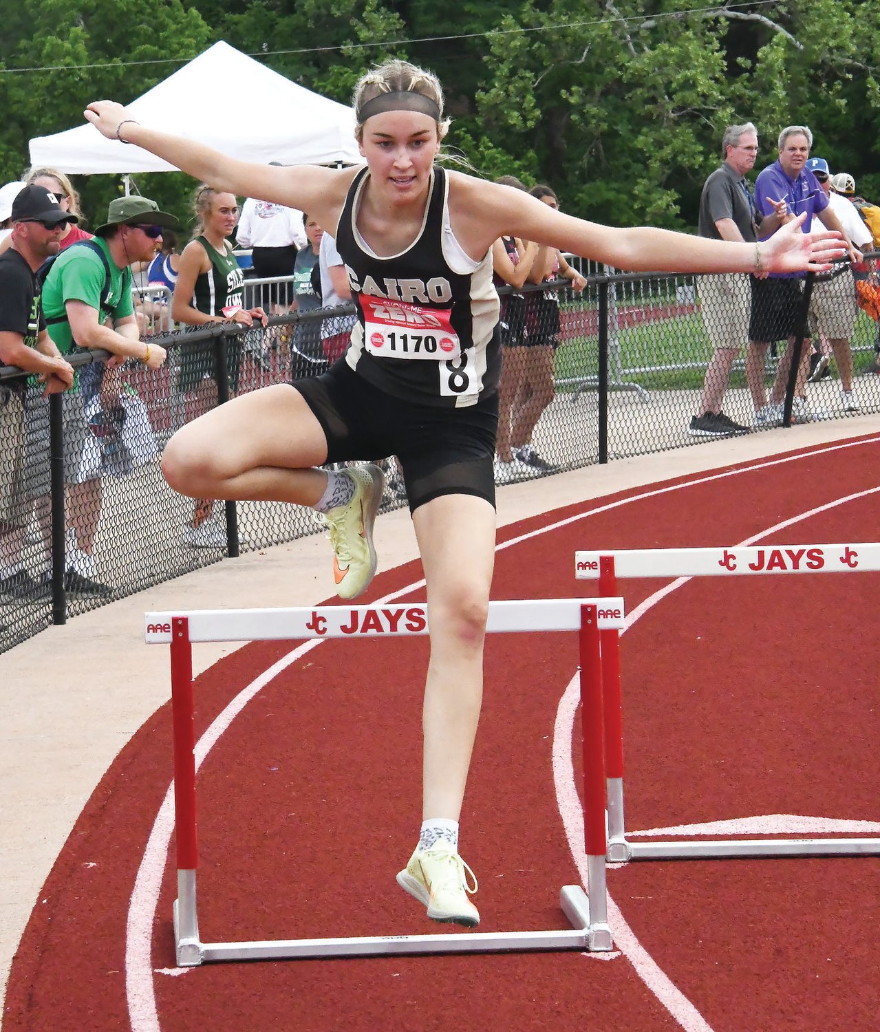 Cairo's Macie Harman clears the bar during the Class 1 girls' 300-meter hurdles on Friday at Adkins Stadium in Jefferson City.