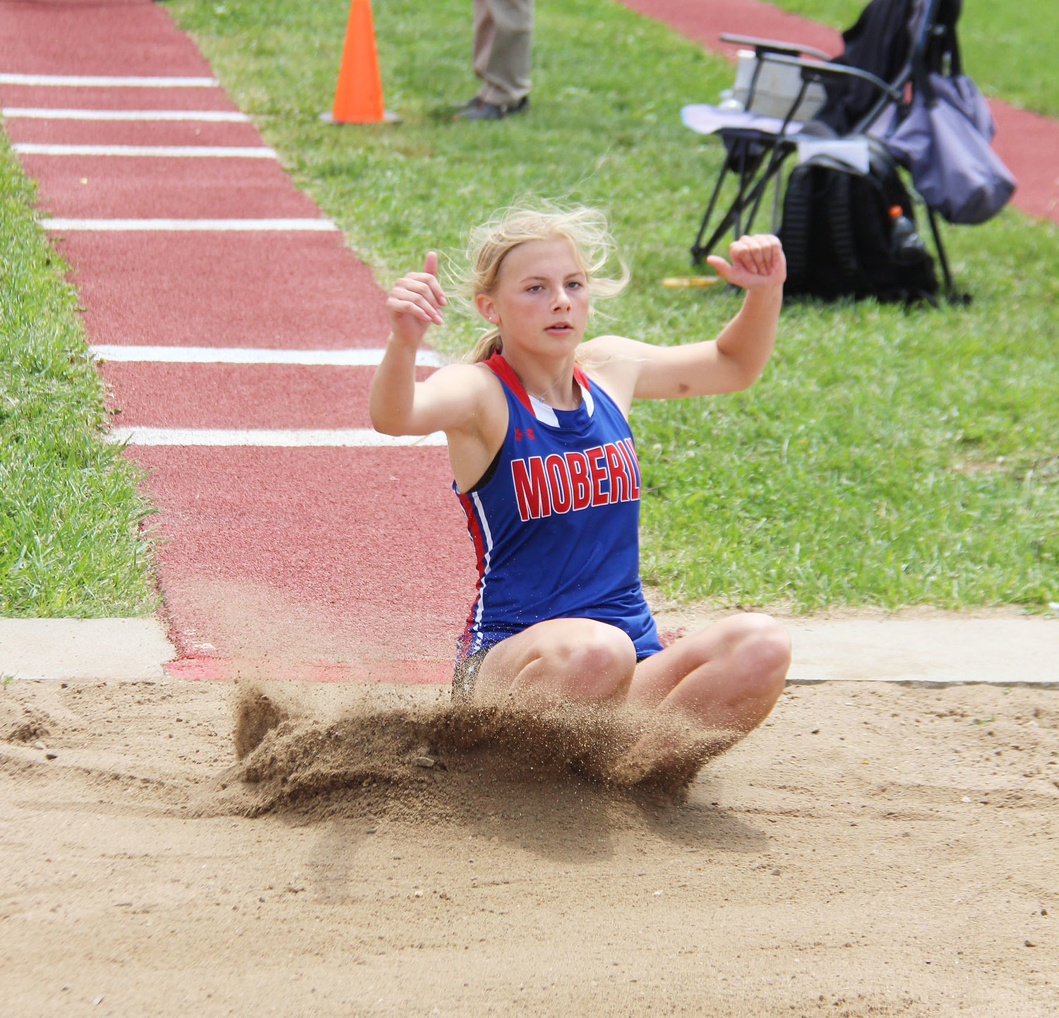 Bryleigh Knox lands in the pit during the triple jump at the Class 4 Section 2 meet from Monday at Mexico High School.