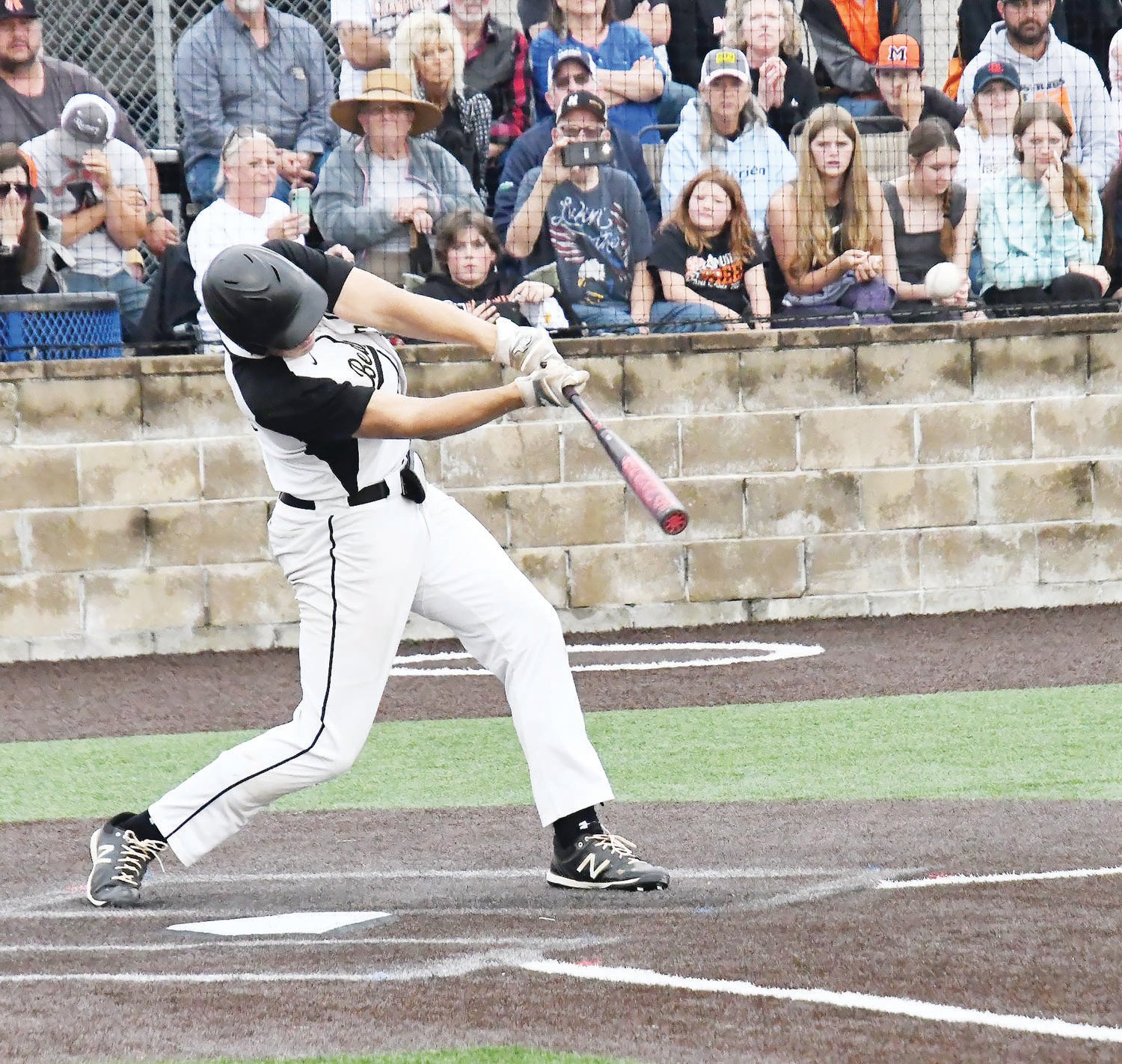 Cairo baseball player Gage Wilson hits a grand slam on Wednesday evening at General Omar Bradley Field, propelling the Bearcats to the Class 1 state championship on Monday.