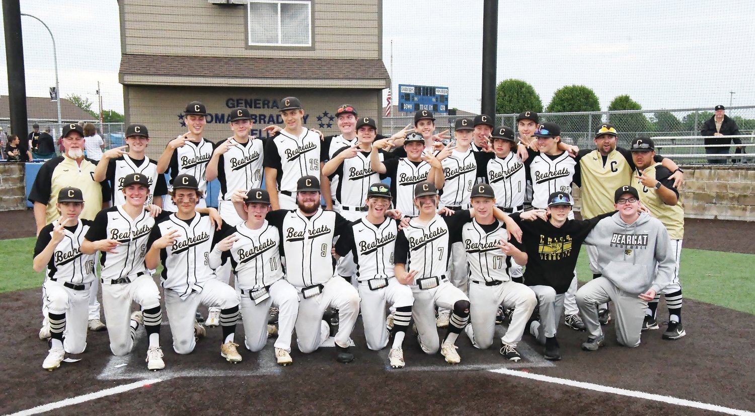 The Cairo baseball team gathers for a group photo after defeating state No. 1 ranked Northwest, 7-6, in advancing to the Class 1 state tournament in Ozark.