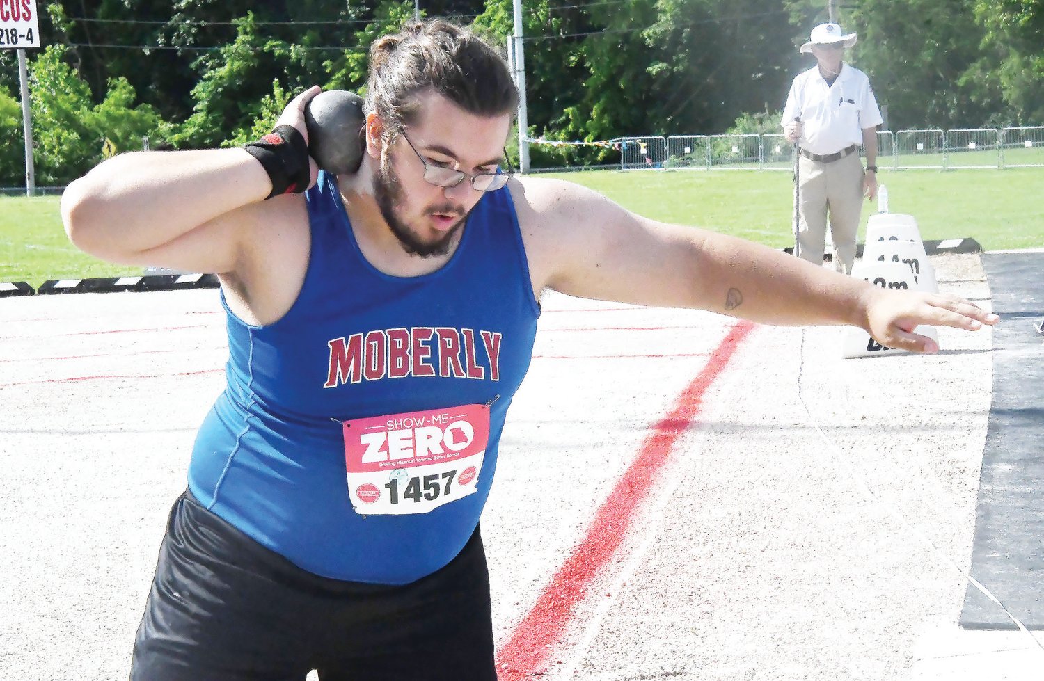Rick Huff begins to spin during a shot put attempt at the Missouri Class 4 state meet Saturday morning in Jefferson City. Huff placed 12th overall with a mark of 13.83 meters (45-feet, 4½ inches).