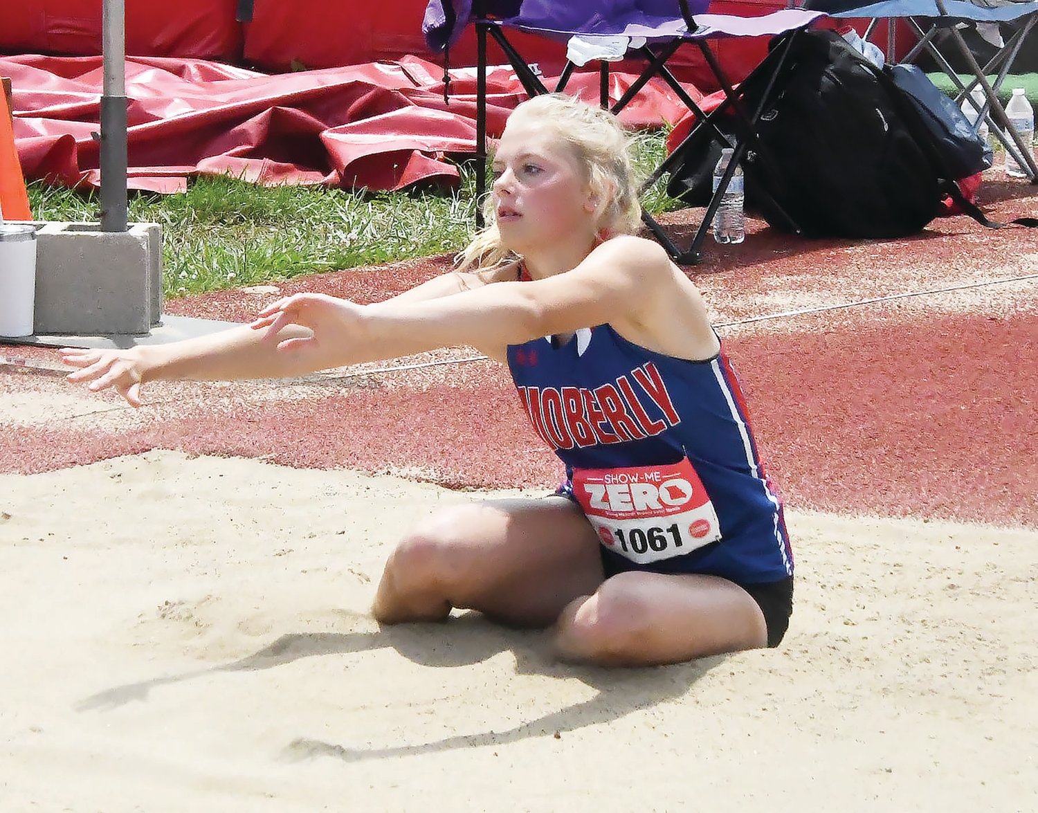 Bryleigh Knox lands in the sand during her third attempt in the triple jump at the Class 4 state meet on Saturday in Jefferson City. Knox marked at 10.46 meters for 11th overall.