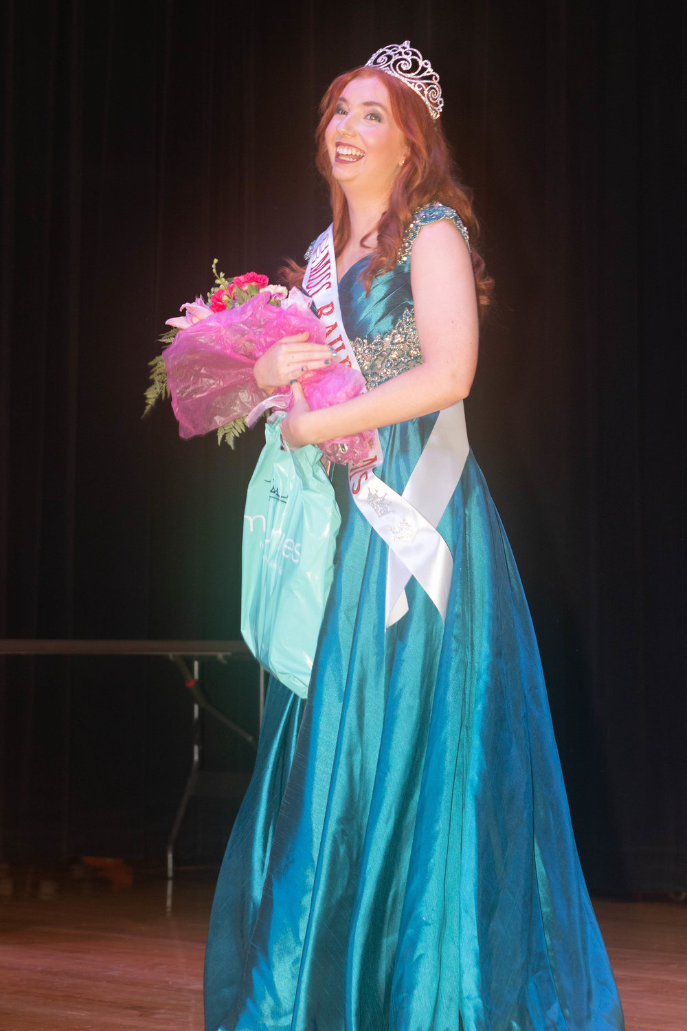 Sophia Milhollin walks the stage after being named Miss Railroad Days 2022.