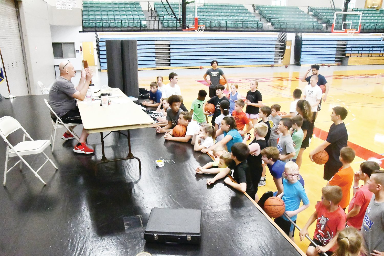 Moberly Area Community College head men's basketball coach and athletic director Pat Smith talks to youngsters during a break at last week's camp. The camp ran from June 6-10 at Fitzsimmons-John Arena.