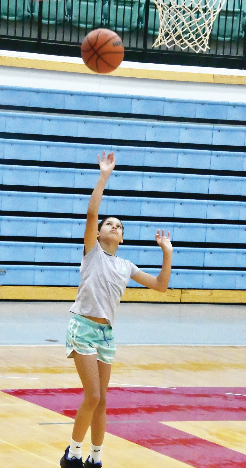 Arrienna Rucker works on her form during a shooting drill at the Moberly Area Community College camp on Tuesday, June 7.