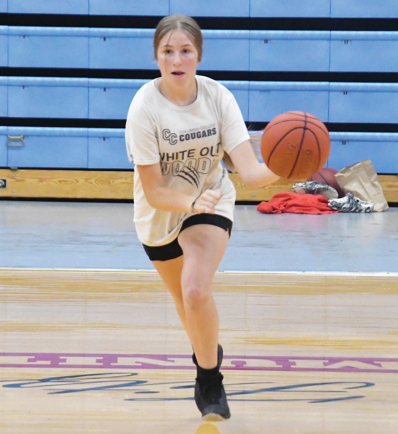 Melia Gittemeier moves up the court with the ball during a dribbling contest at the Moberly Area Community College camp on Tuesday, June 7.