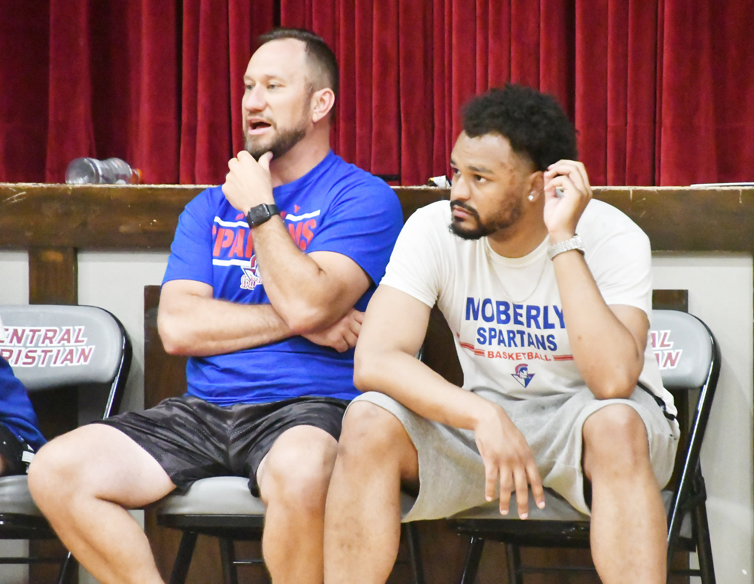 Brad Fuemmeler and Will Rucker look on during Monday's scrimmage. Fuemmeler and Rucker reportedly have been added the Spartan boys' basketball coaching staff as assistants.