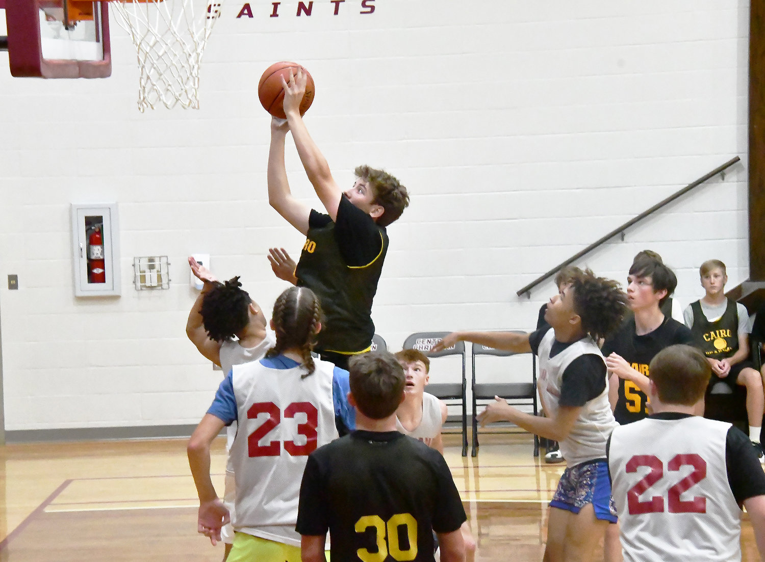 Bryce Chrisman of Cairo drives toward the basket, drawing a foul in the process, during a scrimmage versus Louisiana.