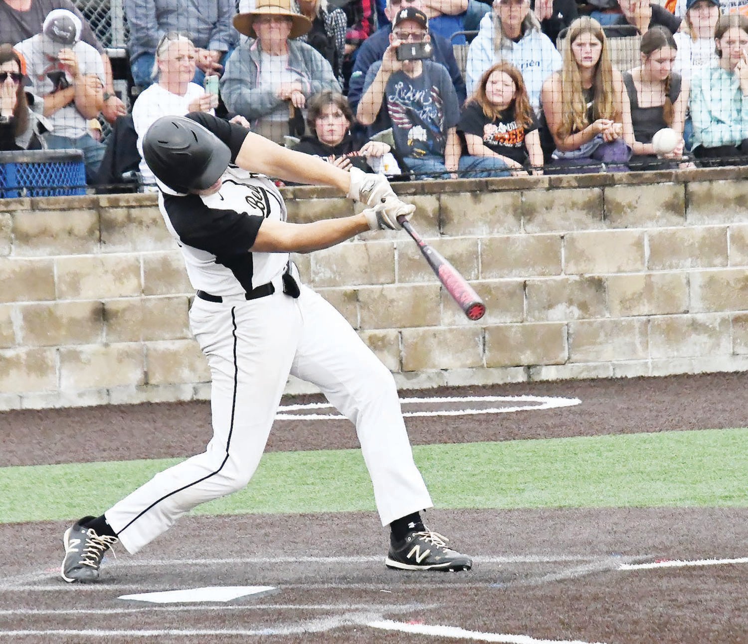 Here's the most memorable photo from the 2022 baseball season, Gage Wilson belts a home run to defeat Northwest (Hughesville), 7-6, during the Class 1 state quarterfinals at General Omar Bradley Field in Moberly on May 25.