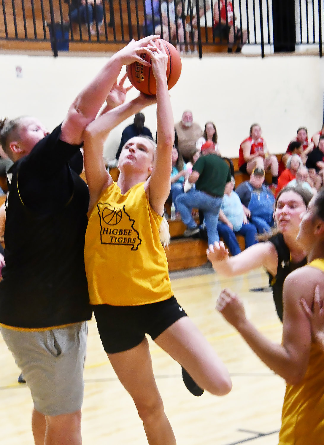Isabelle Welch of Higbee has her shot deflected by a Wellsville-Middletown player during a scrimmage this week.