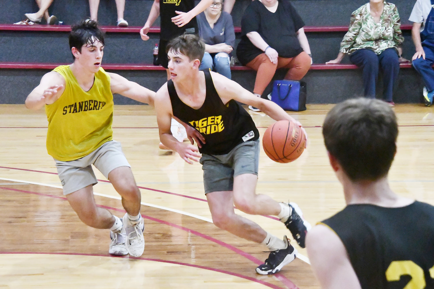 Higbee's Derek Rockett drives the lane during a scrimmage against Stanberry on Wednesday at Central Christian College of The Bible's Pelfrey Hall.
