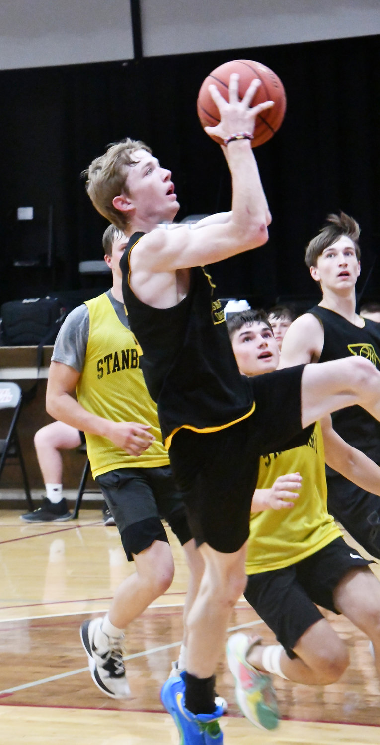 Chad Crawford shoots a layup during Wednesday's scrimmage against Stanberry. The Tigers are coming off a successful season in which they compiled a 26-3 record.
