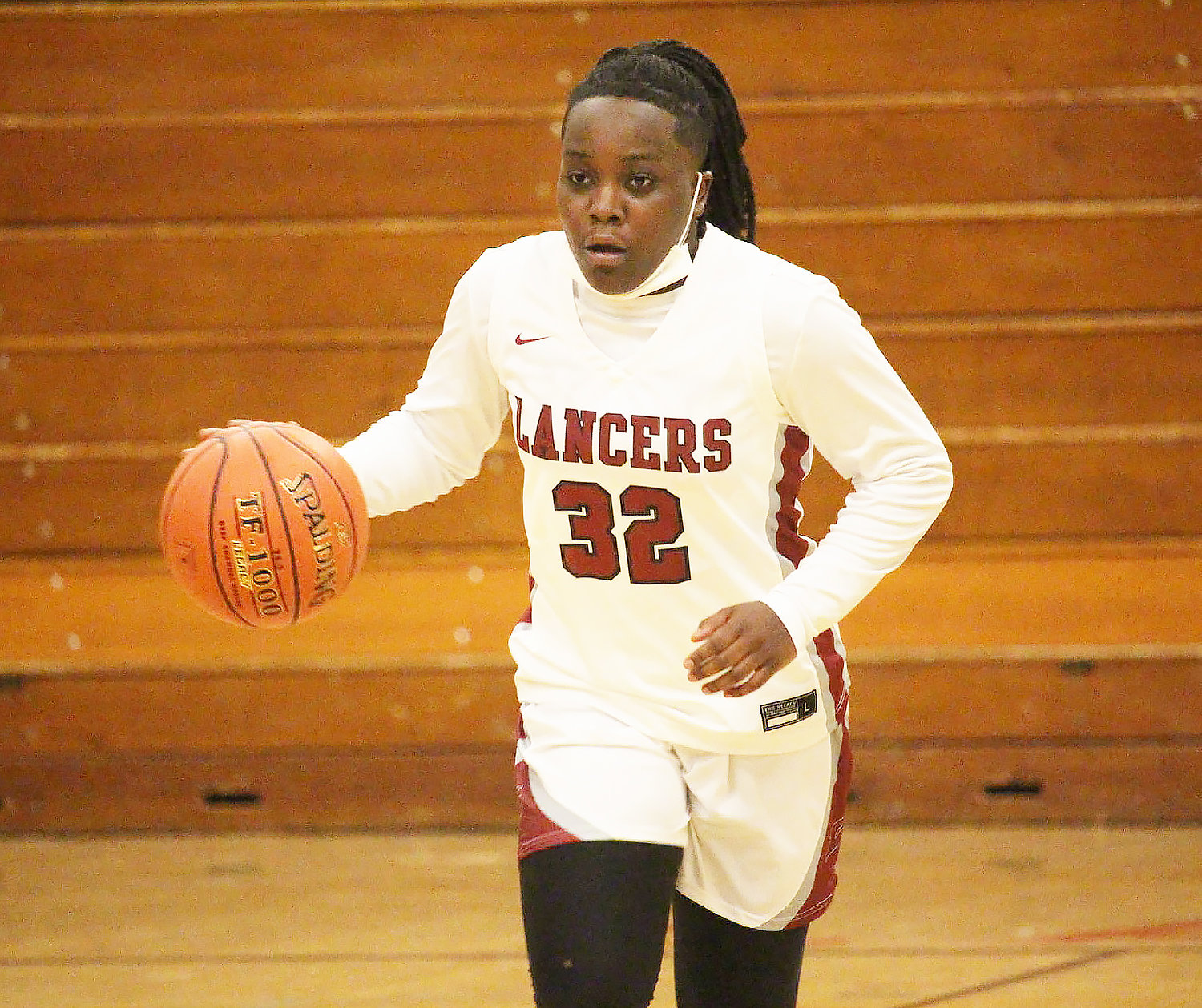 Aaliyah Smith (32) dribbles up court for La Follette, a high school based in Madison, Wis. Smith, a highly recruited point guard, made it official on Thursday afternoon, signing with the Moberly Area Community College women’s basketball team.
