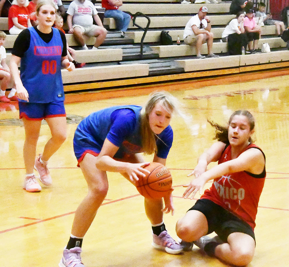 Moberly's Asa Fanning battles for a rebound during the scrimmage versus Mexico.