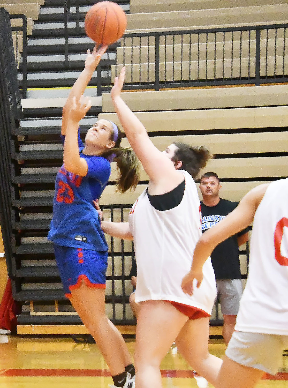 Moberly's Kennedy Messer moves inside for a layup while playing Chillicothe in a scrimmage. Messer scored on the play.