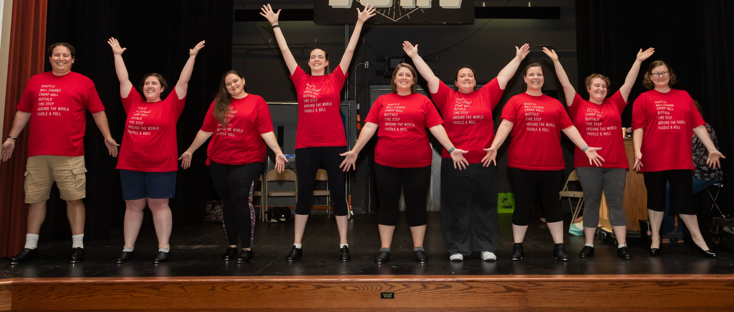 The cast of “One Night a Week” ends a dance number at the edge of the stage during rehearsal Tuesday. From left are Robert Klick, Kelsey Jeffries, Christina Booth, Samantha Boisclair, Erin Shirk, Maggie Wright, Jennifer Ortman, Evelyn Ortman and Vickie Fischer. Pianist Leah Stein rounds out the cast. The play opens at 7:30 p.m. Friday, July 1 at 4th Street Theatre in Moberly.