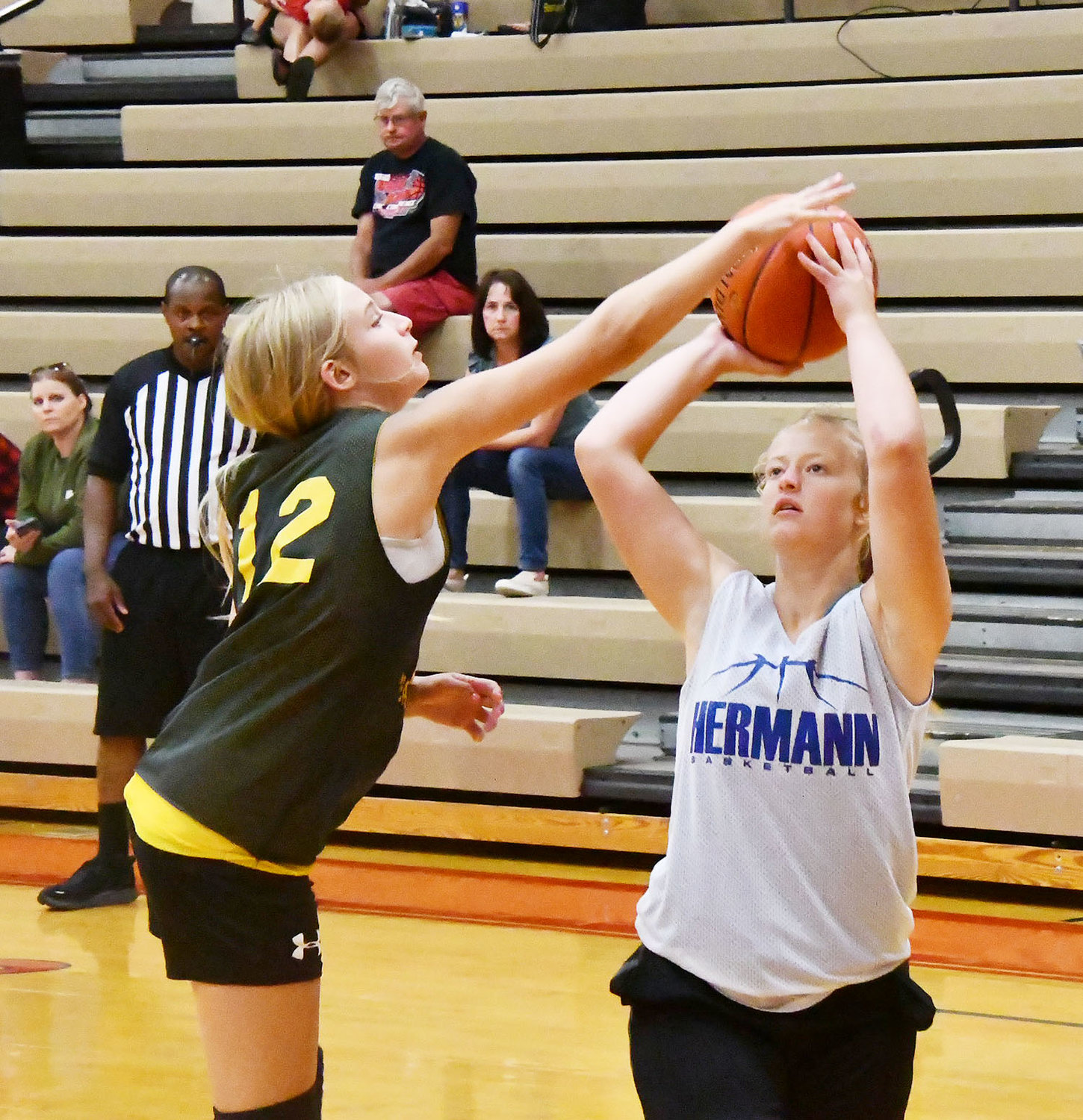 Cairo's Addison Bailey blocks a Hermann shot attempt during the first half of Tuesday's scrimmage.
