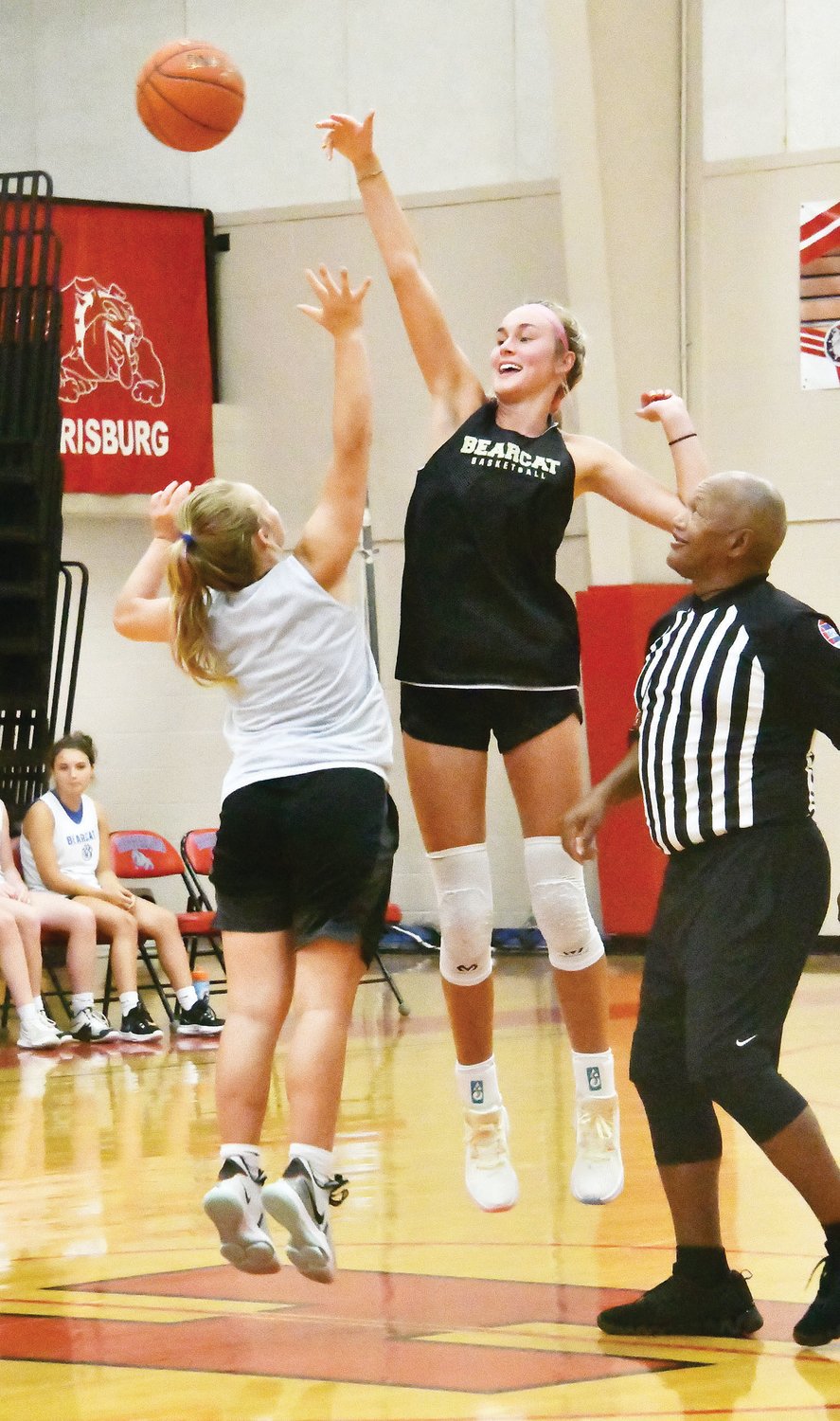 As expected, Cairo's Macie Harman wins the jump ball to open the "sudden victory" period.