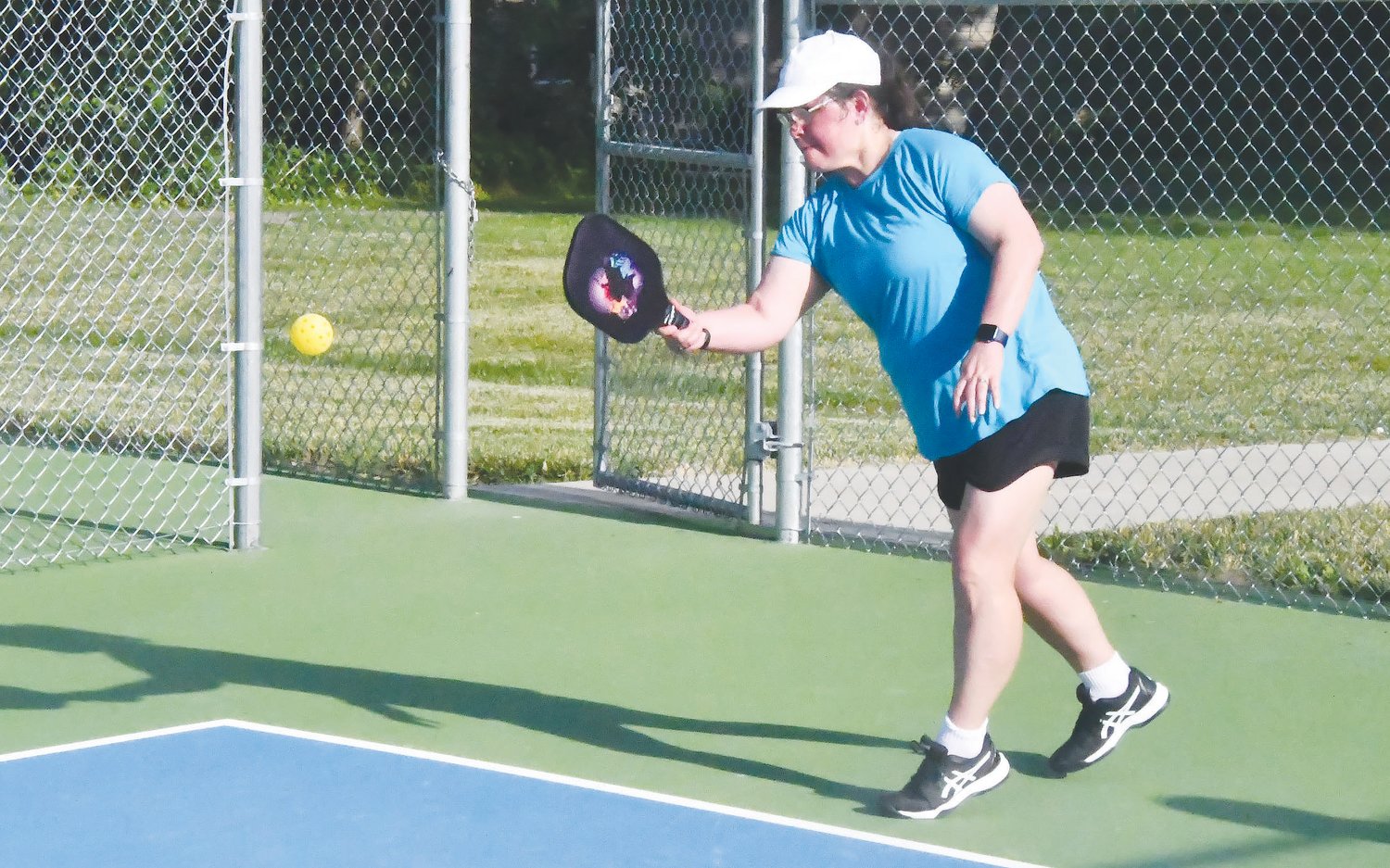 Norma Wamsley returns a shot during a pickleball match on Thursday, June 16, at Fox Park in Moberly.