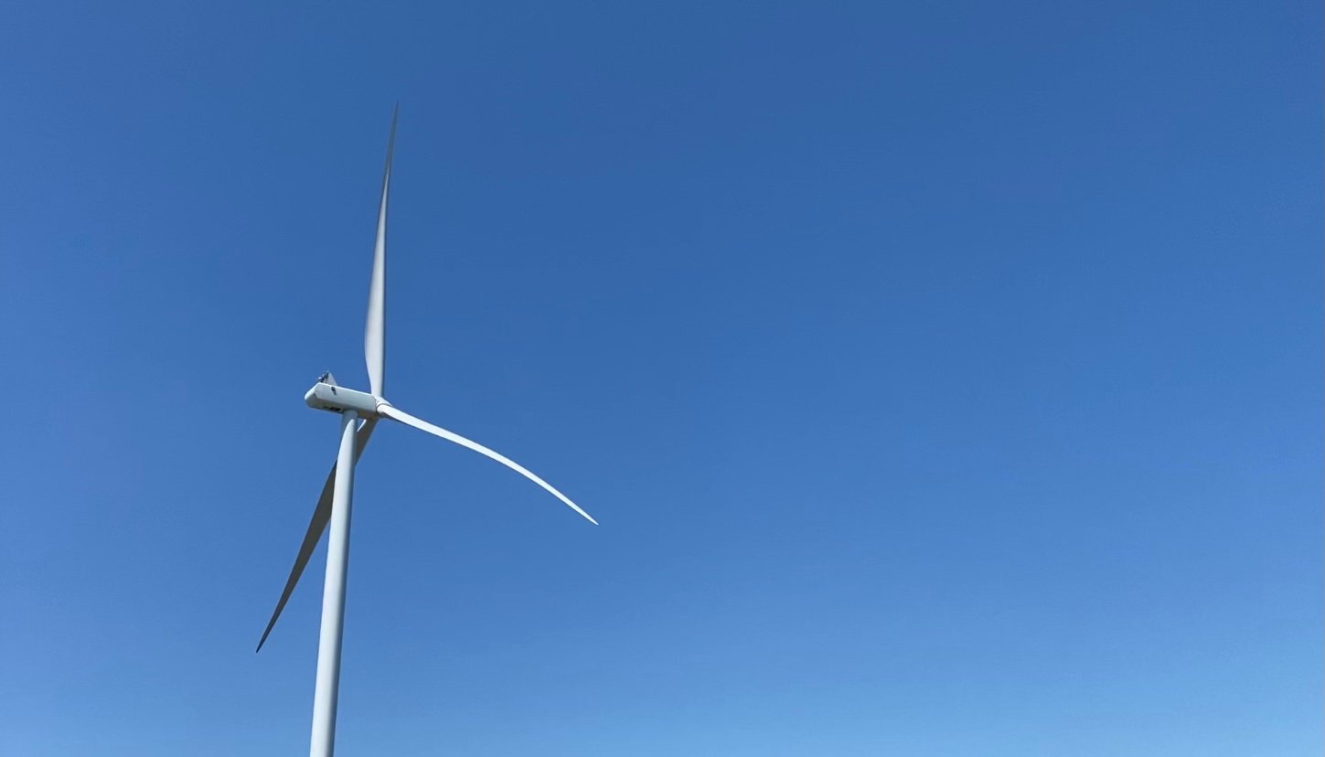 A wind turbine towers above Queen City, Missouri. Ameren, the electrical provider for much of eastern Missouri, acquired the High Prairie Renewable Energy Center in late 2020.
