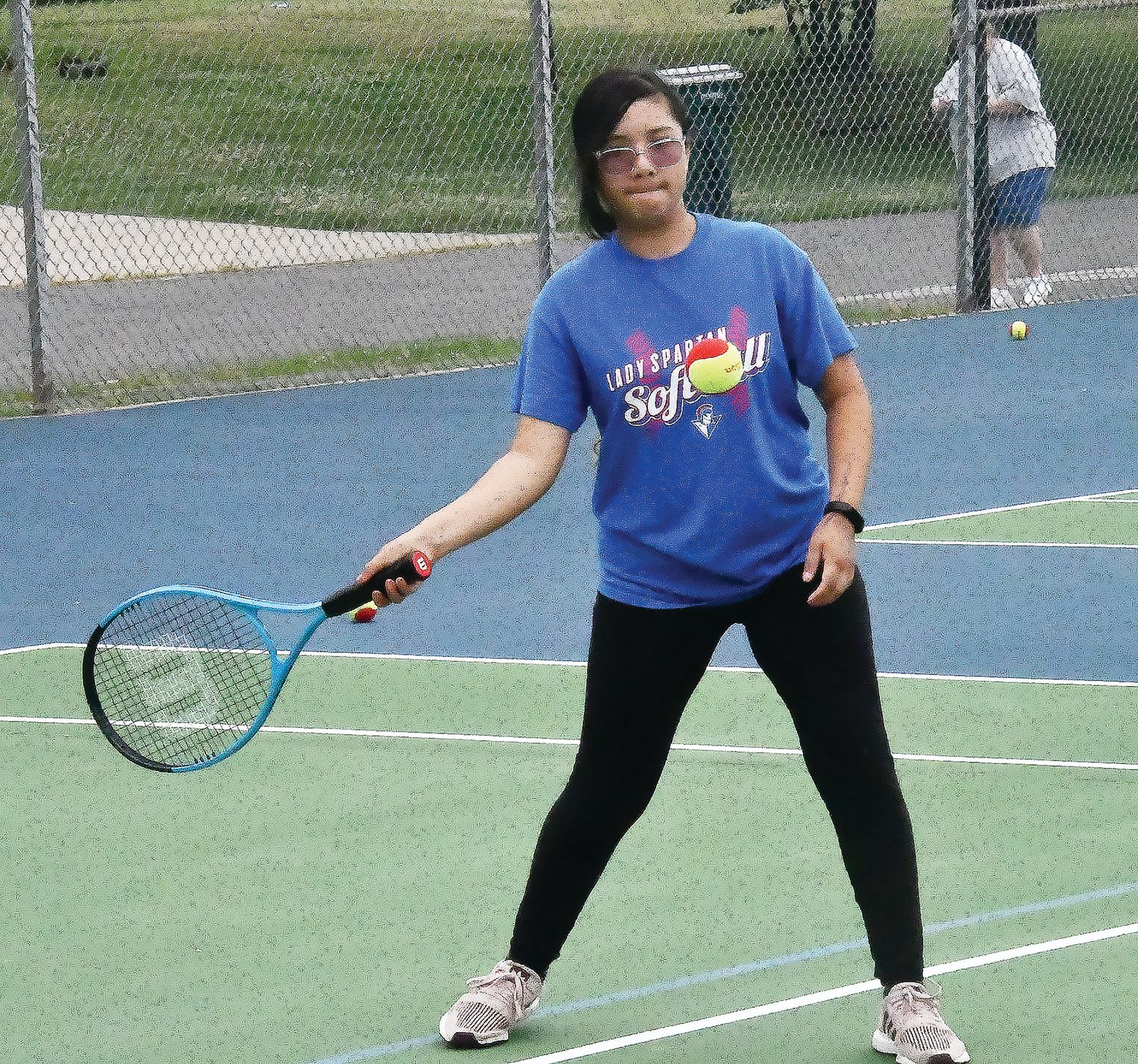 Natalie Perez prepares to hit the ball during tennis lessons on Friday, June 24, at the Shelter One Courts inside Rothwell Park.