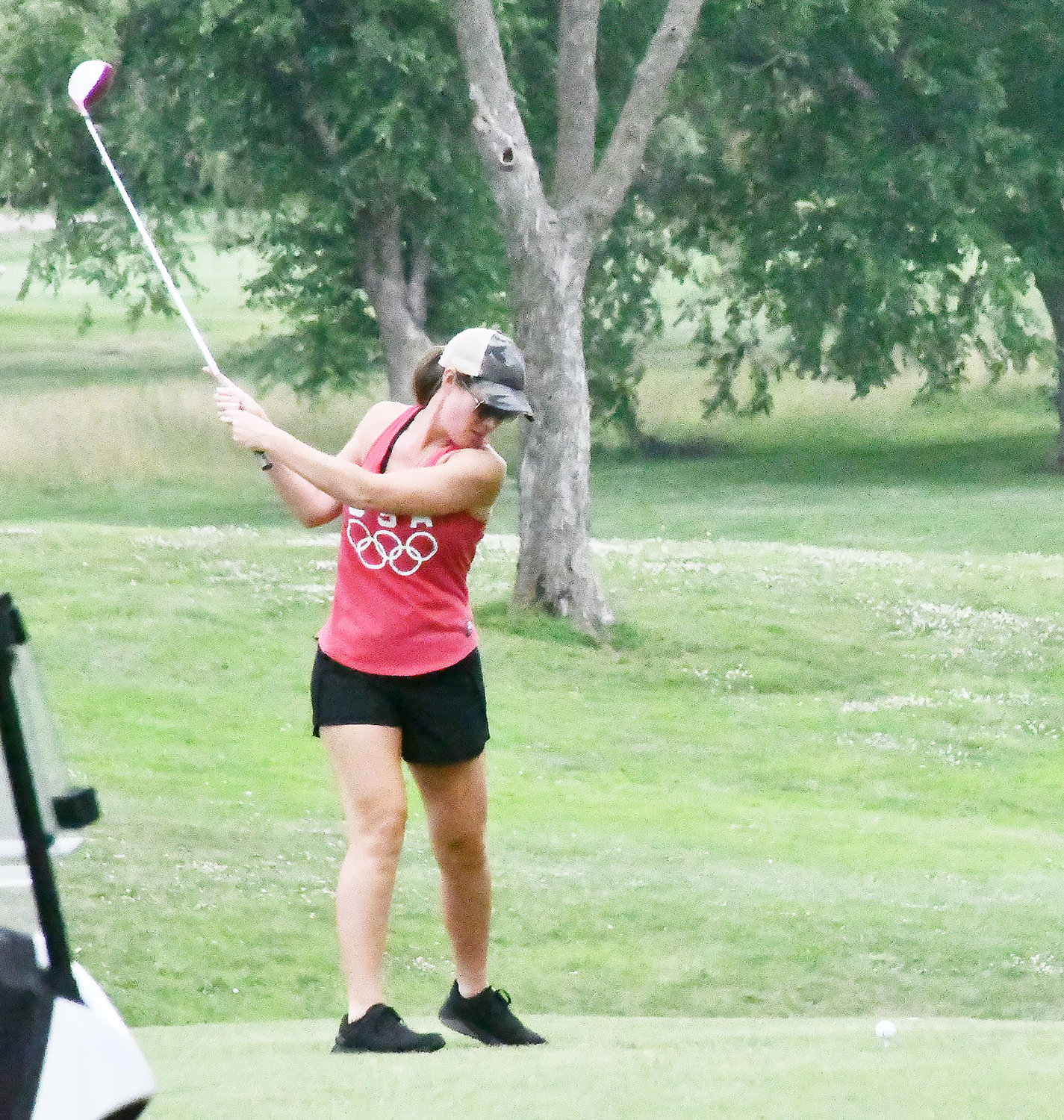 Jessica Morris tees off on Hole No. 1 during the Moberly Spartan Booster Club tournament.