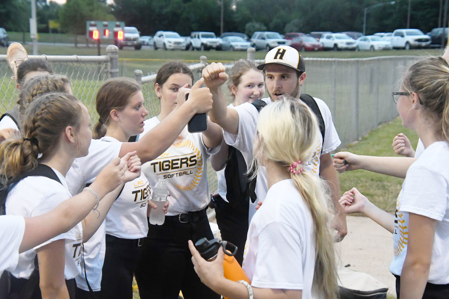 Higbee's Ryan Vogelsong leads the Tigers in a cheer following Thursday's win. Also photographed are Emma Johnson, Kylleen Gibson, Madi White and Raegan Derboven.