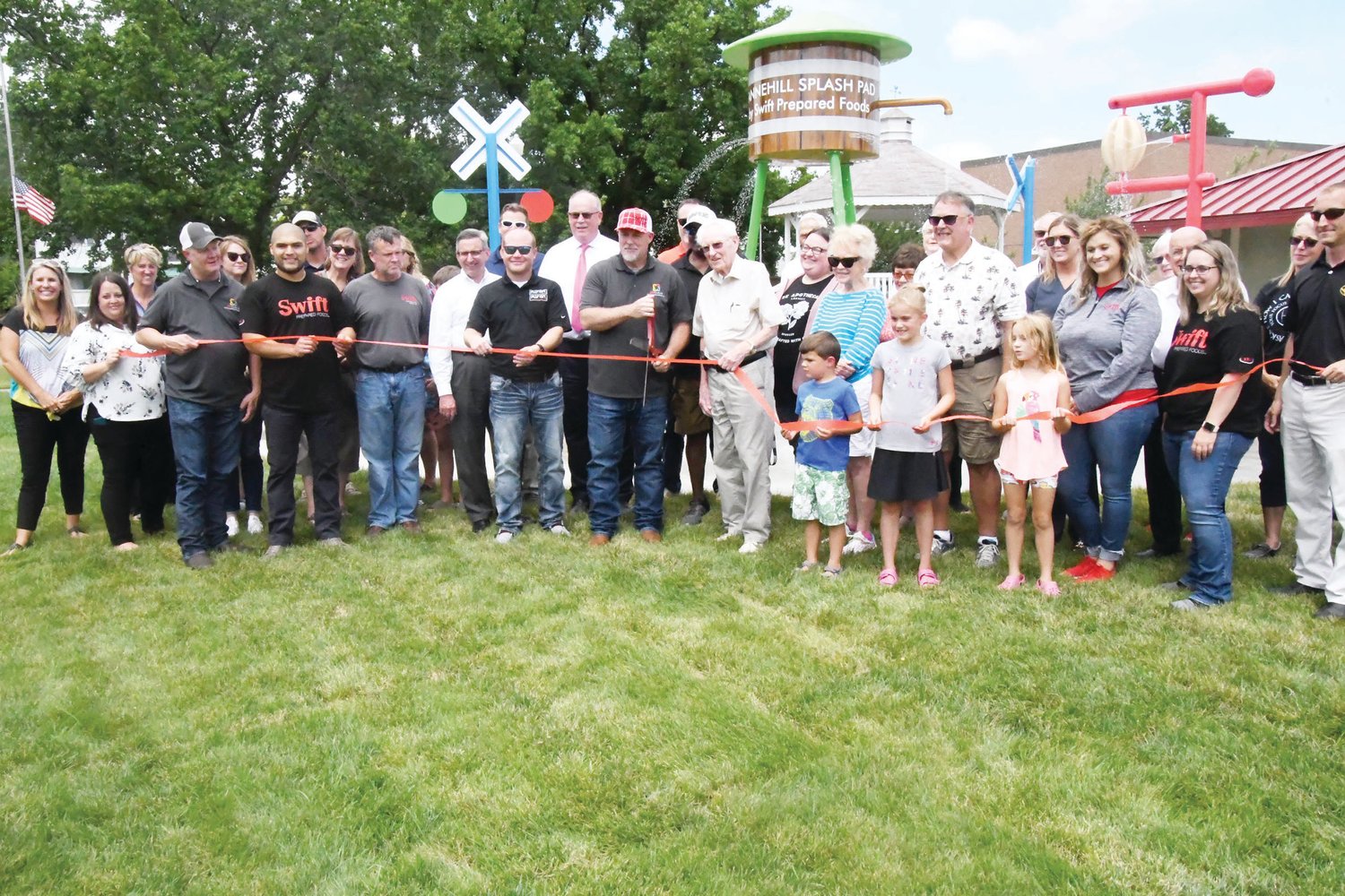 Dignitaries from Moberly city government, the Moberly Parks and Recreation Department and industry were present at the ribbon cutting for the new Tannehill Park Splash Pad.