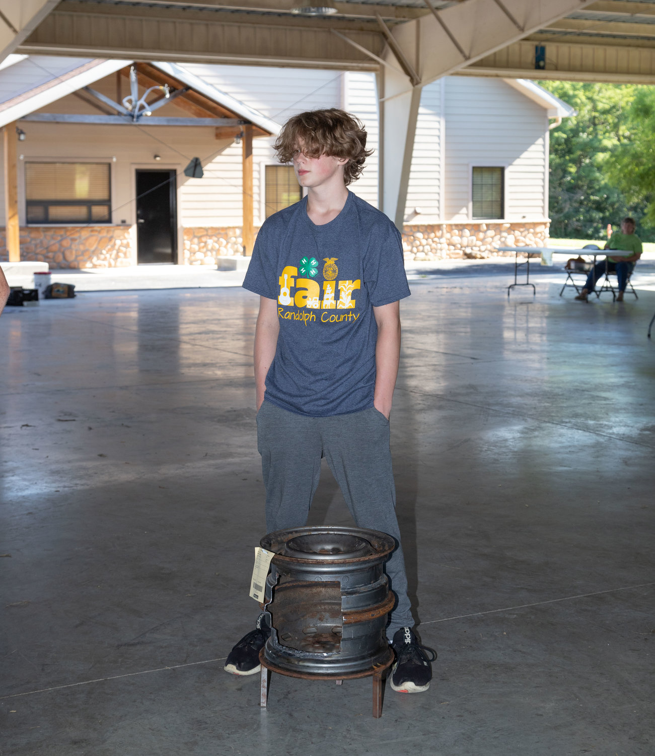 Keegan Dixson, 13, of Moberly, used his welding skills to turn a couple of tire rims into an artistic fire pit. The project was one of many judged Monday during achievement night at the Randolph County Fair.
