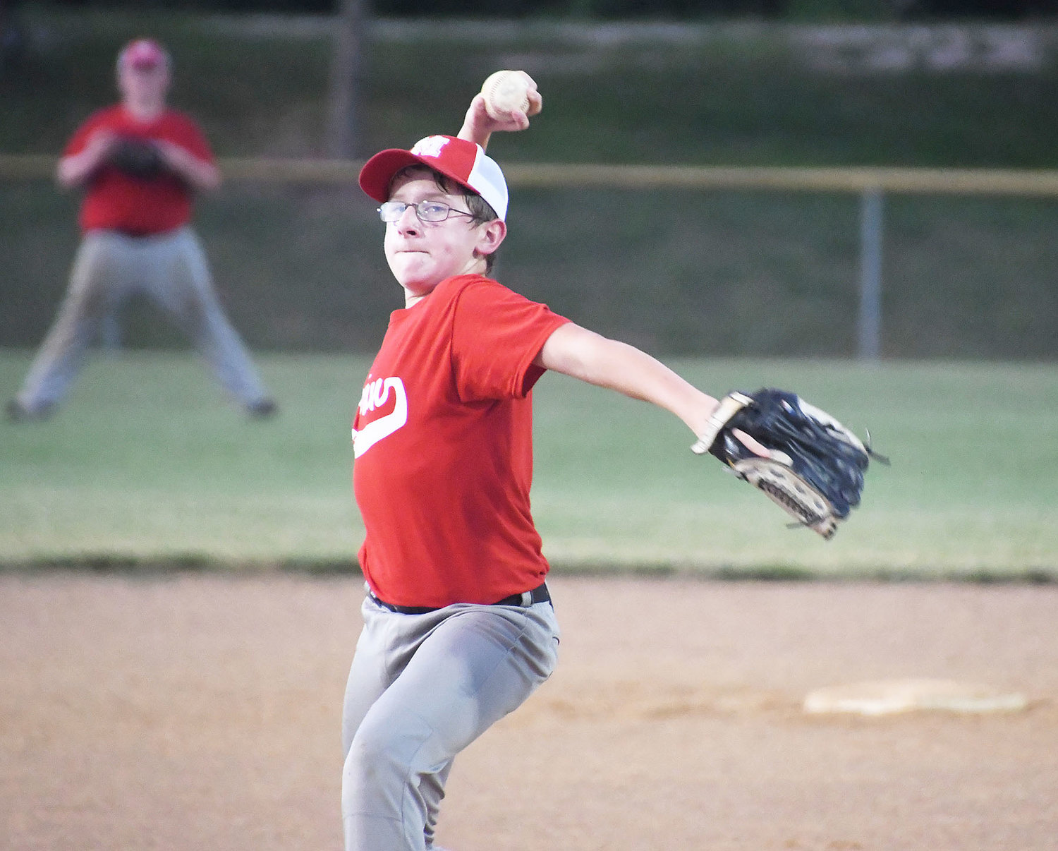 Spartan Heat pitcher Izik Burton deals toward home plate during the game versus the Bombers on Monday, July 11.