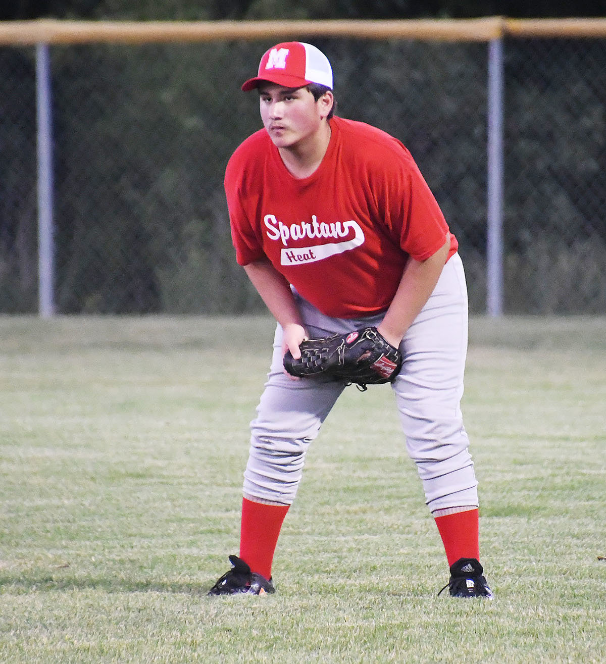 Enrique Salazar prepares while playing the position of right field for the Spartan Heat.