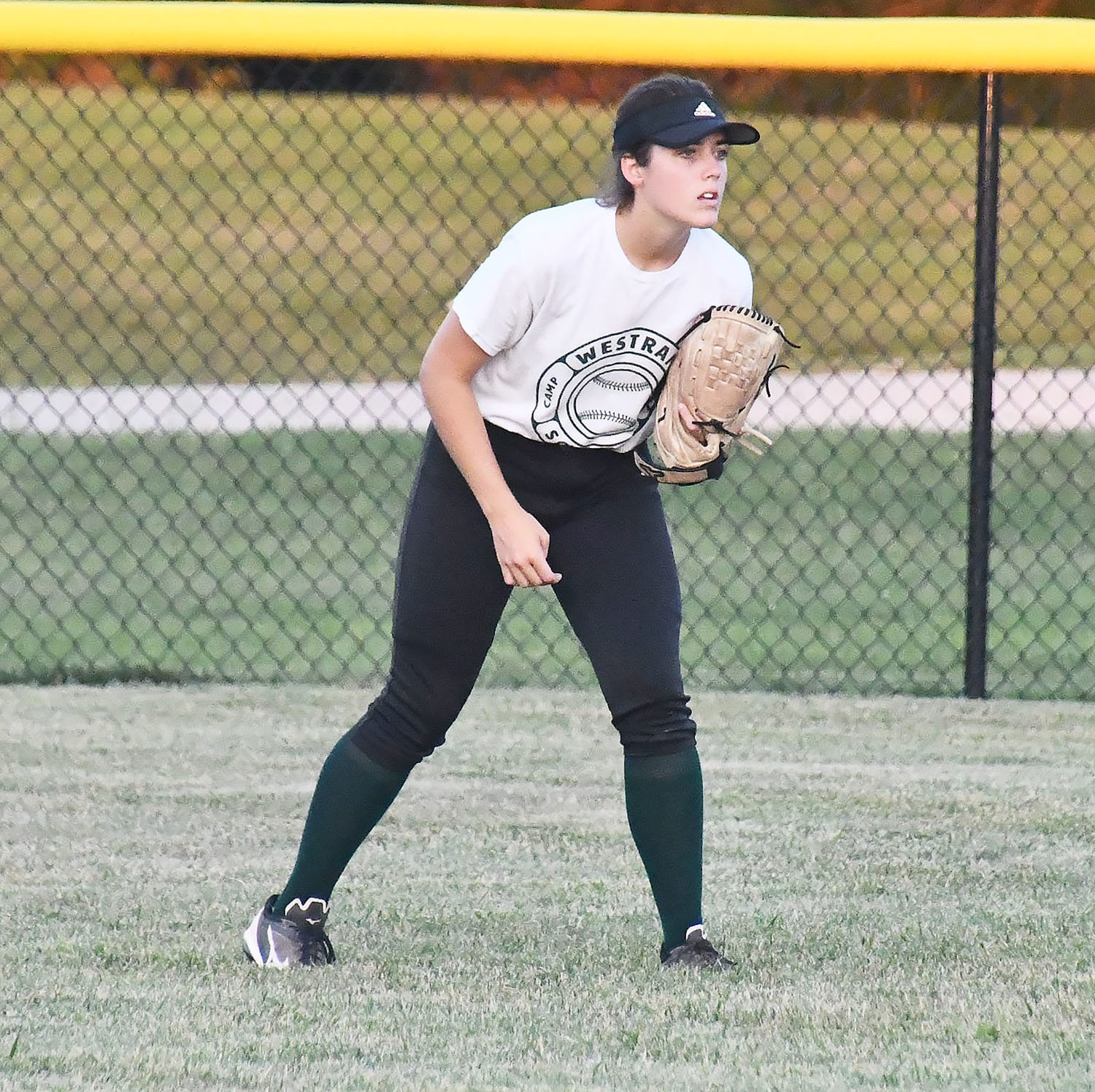 Mallory Brown of Westran looks ready to make a play from her position in center field.