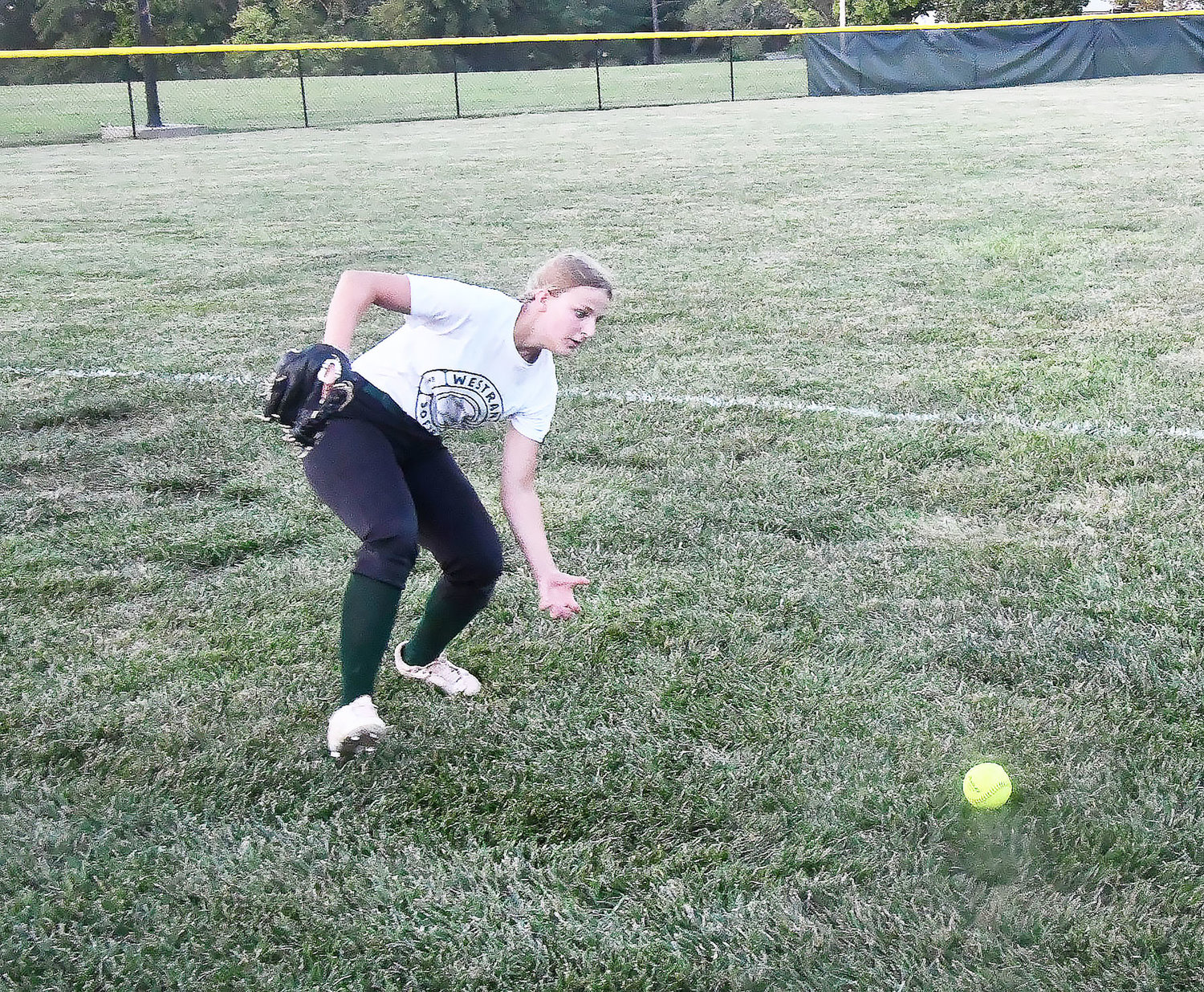 Westran's Lizzy Dollich fields a ball that was ruled fair, resulting in a double for visiting Harrisburg.