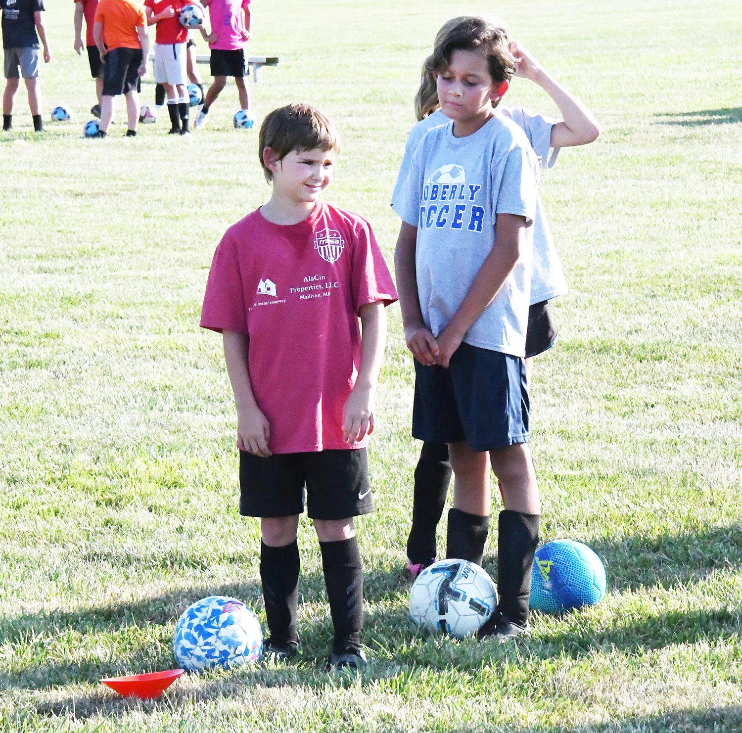 Soccer players prepare for a shooting drill. Youth worked on both shooting power and shooting accuracy.
