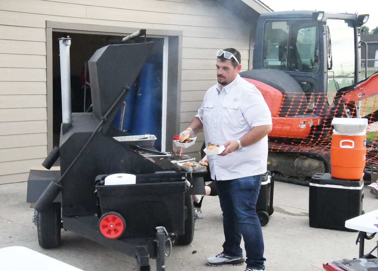 Denny Price manned the grill, with the Fraternal Order of Eagles of Moberly providing meal deals for the fans.