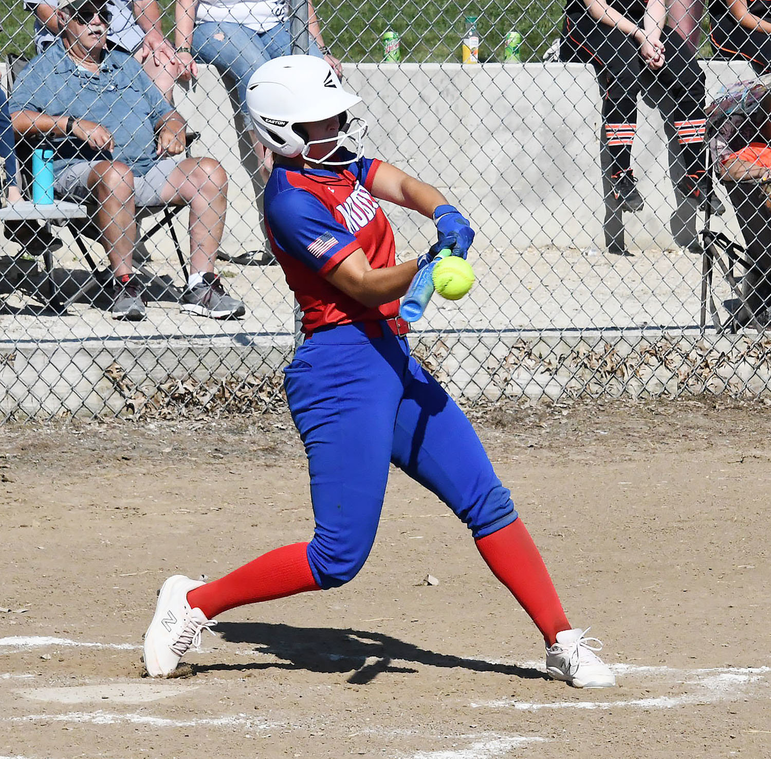 Moberly's Kennedy Messer makes contact for a run-producing double during the jamboree contest against Macon.