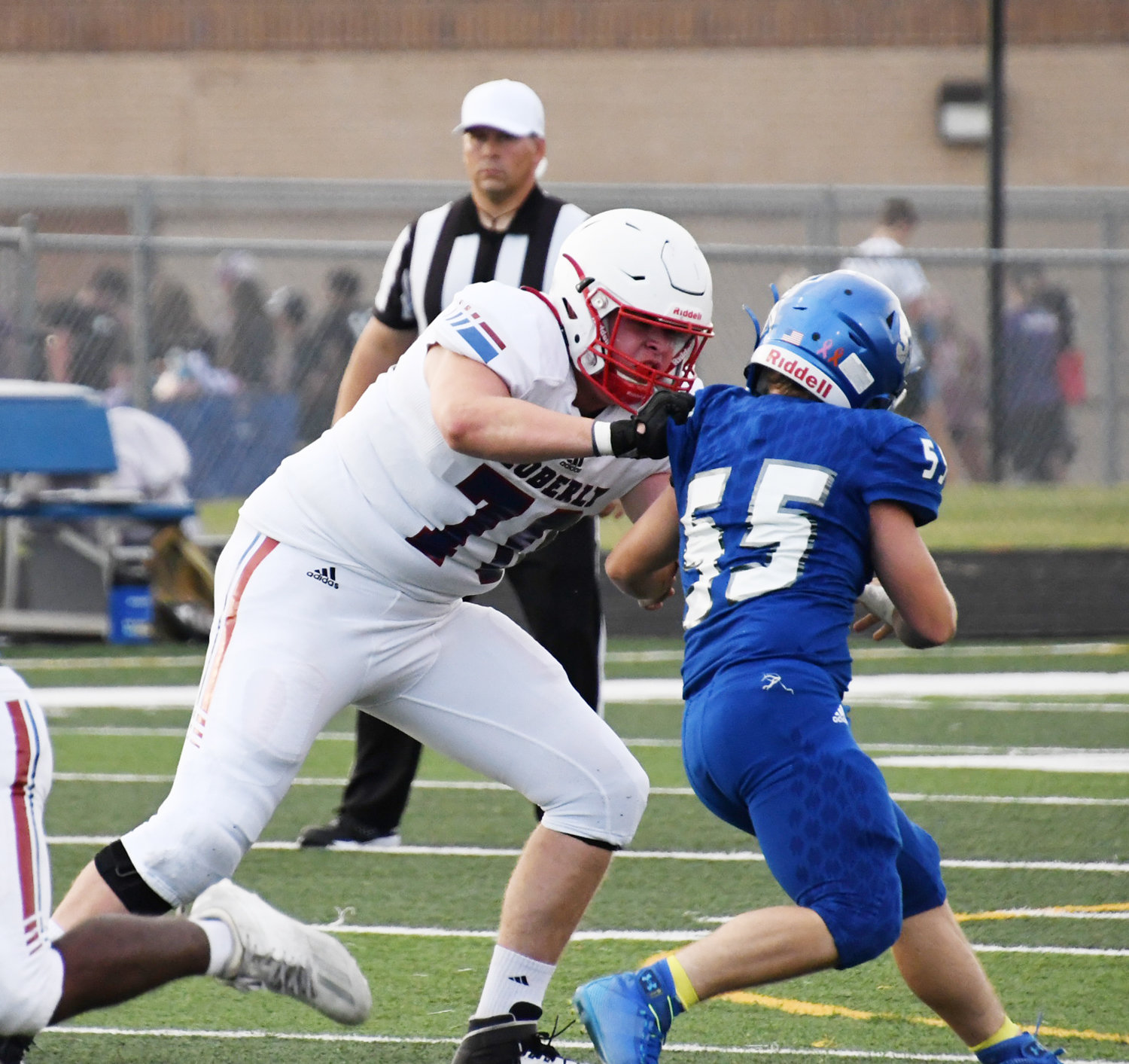 Devin Snow (70) of Moberly controls the line of scrimmage with this block.