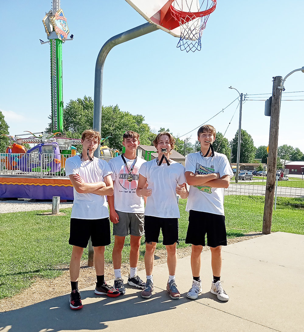 The Bang Brothers won the 3-on-3 basketball tournament Saturday, Aug. 20. The team featured, in no particular order in this photograph, Derek Rockett, Keetun Redifer, Malaki Squires and Jaxon Hudson.