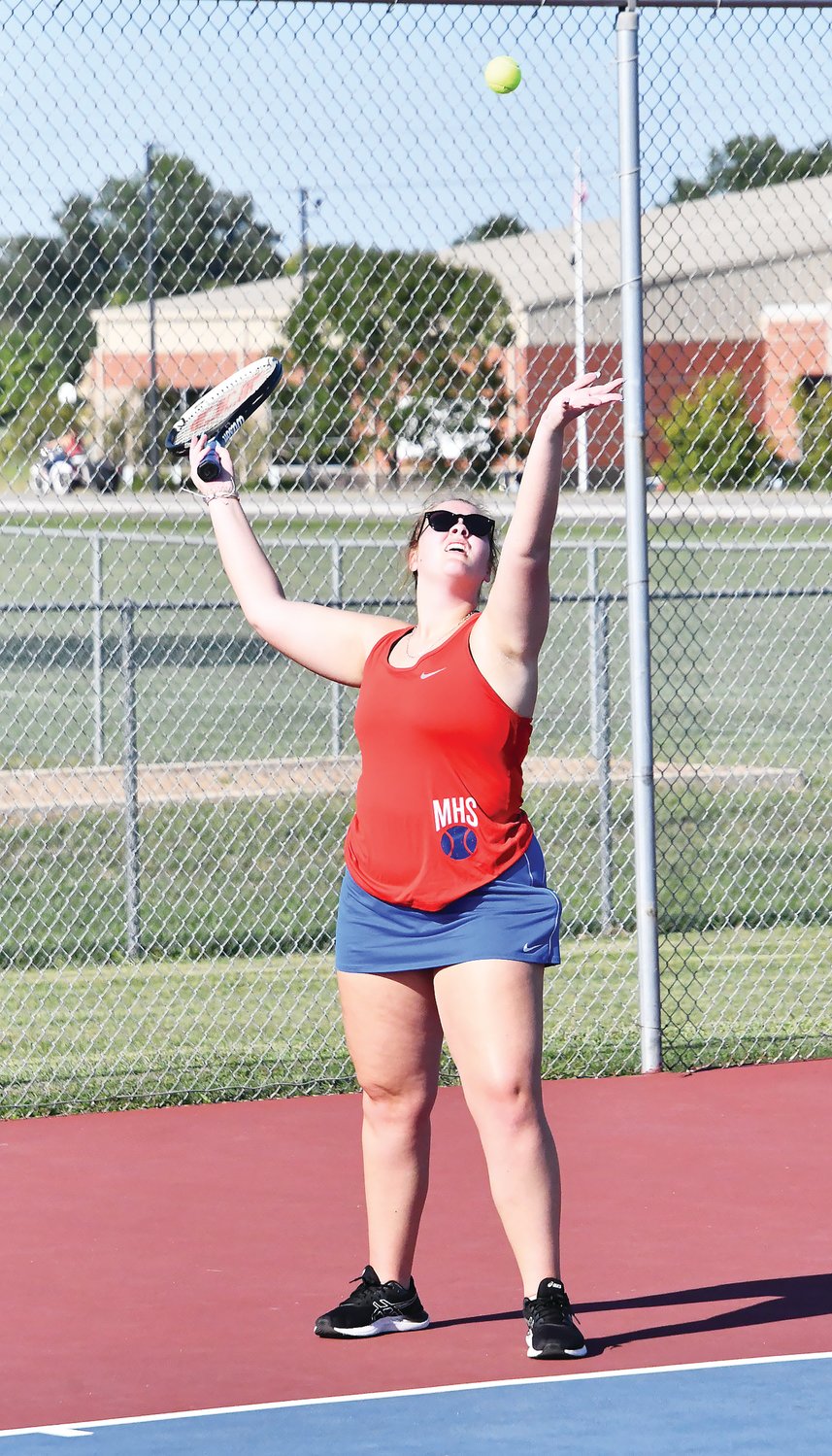 Aleiya Myers serves during a North Central Missouri Conference duel against Fulton. Myers’ serve is tough to return, with its spin and power. She won in both singles and doubles during the opener on Friday, Aug. 26.